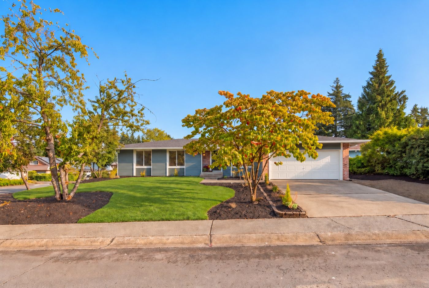 Redmond rambler after new lawn, garden beds and fresh exterior paint